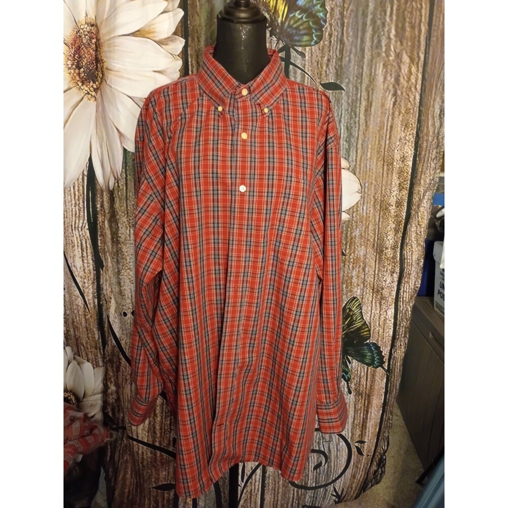 Nautica button-down shirt features a classic red and navy-blue plaid tartan